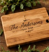 Bamboo cutting board engraved with a family name