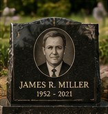 Granite memorial plaque with an etched portrait